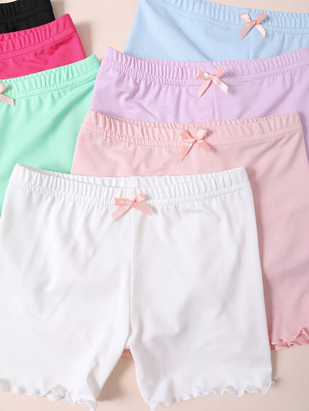 Girls' Seven-Pack Boxer Briefs with Bow Details and Lettuce Hems in Solid Colors for Everyday Layering