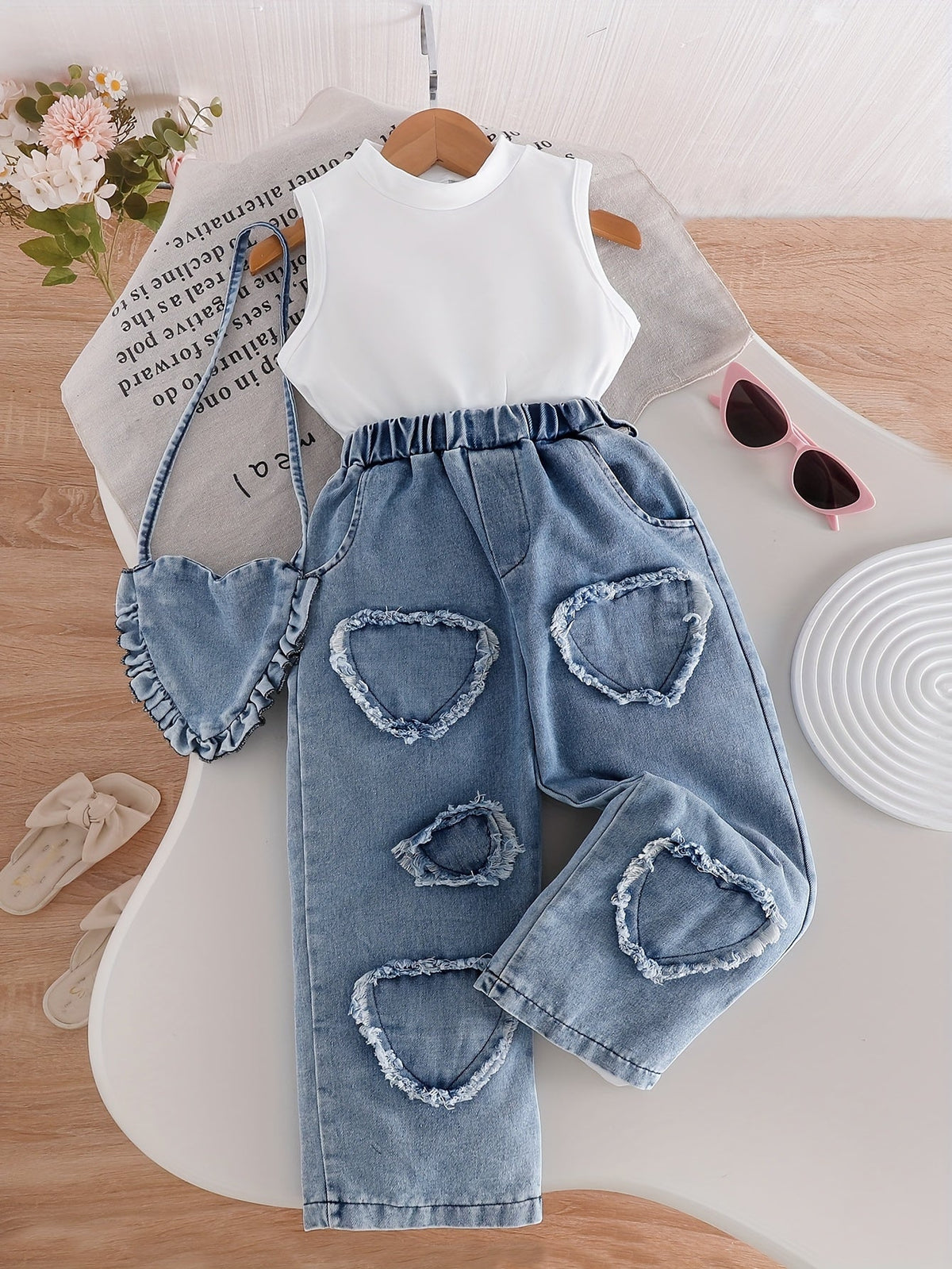 Girls White Tank Top and Heart Patch Denim Pants Outfit with a Matching Heart Bag for Casual Days