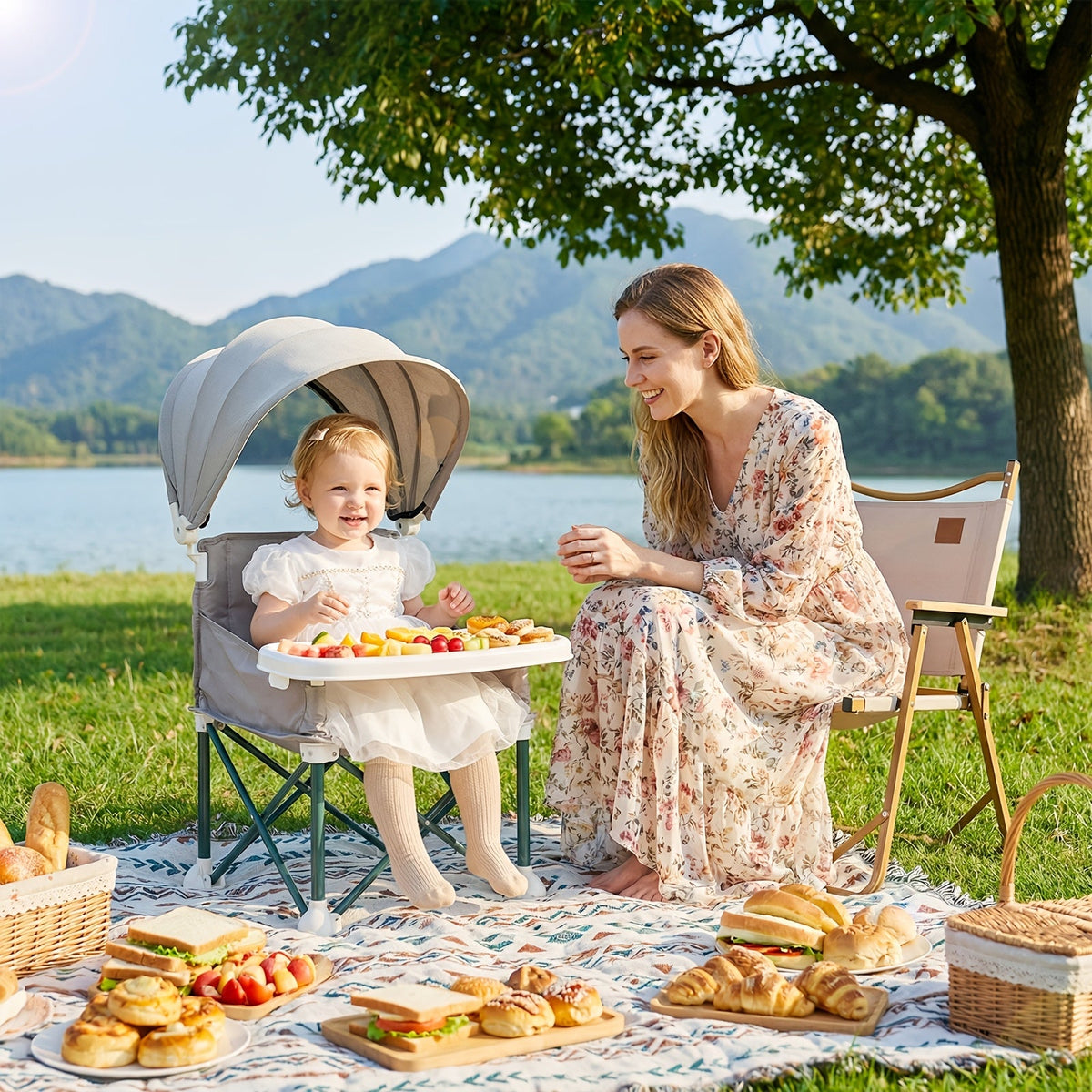 Portable Baby Booster Seat with a Canopy and Detachable Feeding Tray for Family Meals on Days Out
